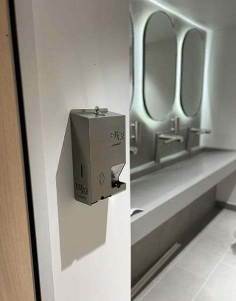 dette er en dispenser på et offentlig toalett